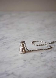 Spjälltofs – Kachelofengewicht, Quastenform, Nickel thumbnail image