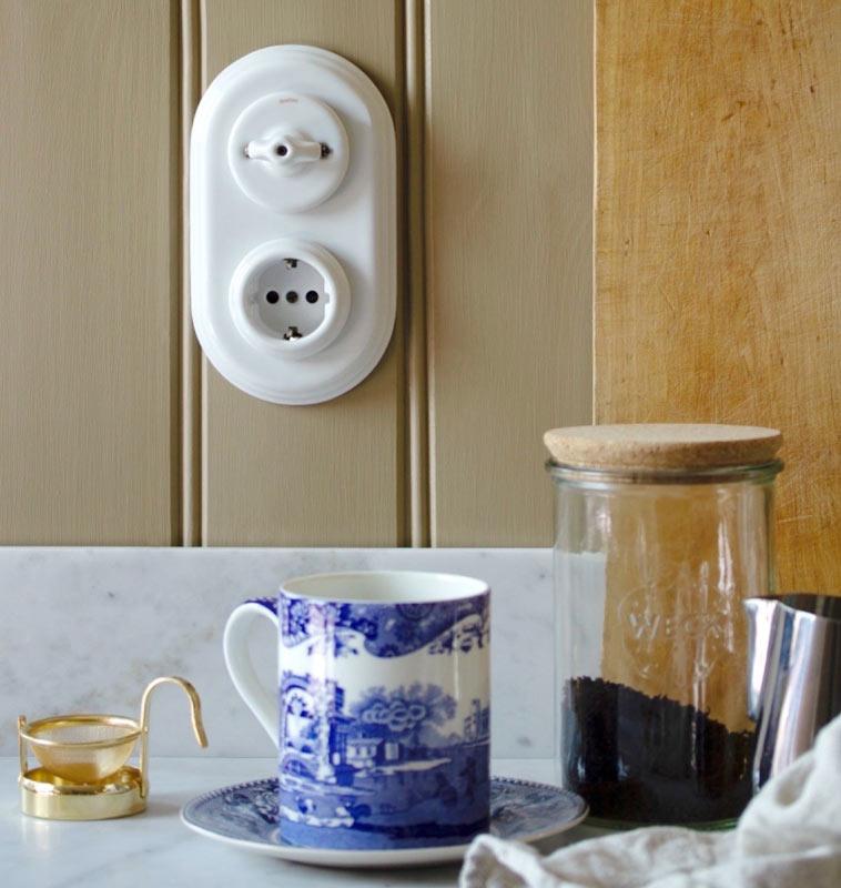 Outlet & Rotary Light Switch - White porcelain image