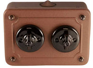 Two-way porcelain light switches in metal box - black porcelain/aged metal thumbnail image